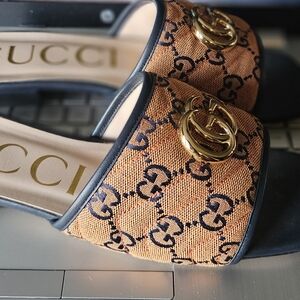 Gucci Women's Tan and Black Mules with Gold Logo